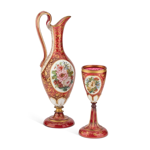 30 - A 19TH CENTURY BOHEMIAN GILDED AND PAINTED RUBY GLASS EWER AND GOBLET (2) Ewer 38cm high