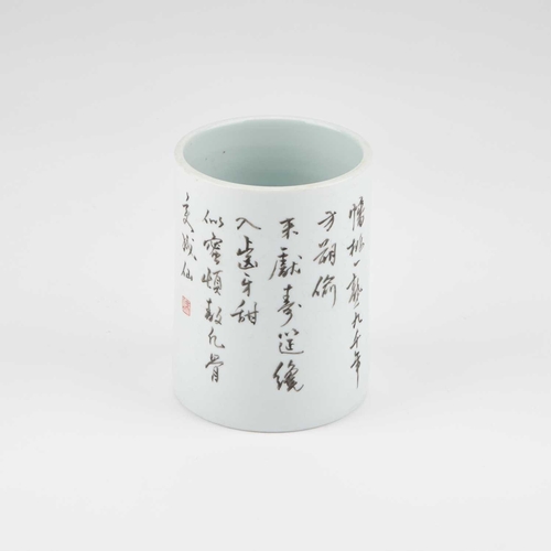 110 - A CHINESE INSCRIBED BRUSHPOT cylindrical, painted with a figure. 13cm high