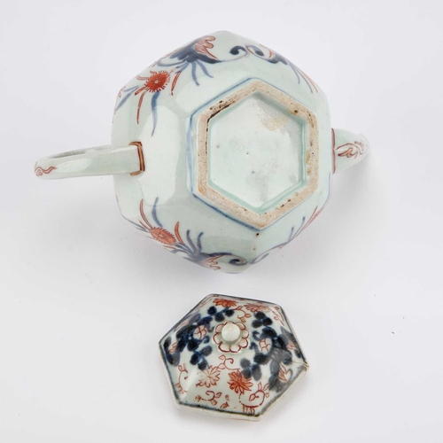 115 - A CHINESE IMARI TEAPOT AND COVER, 18TH CENTURY hexagonal, decorated in the characteristic palette. 9... 