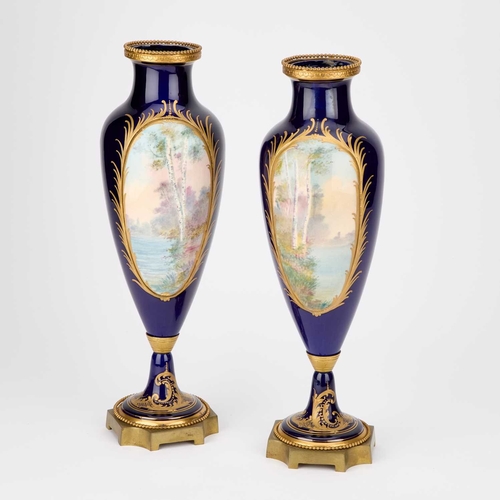 116 - A LARGE PAIR OF ORMOLU-MOUNTED SÈVRES STYLE PORCELAIN VASES, CIRCA 1880 of ovoid form, each painted ... 