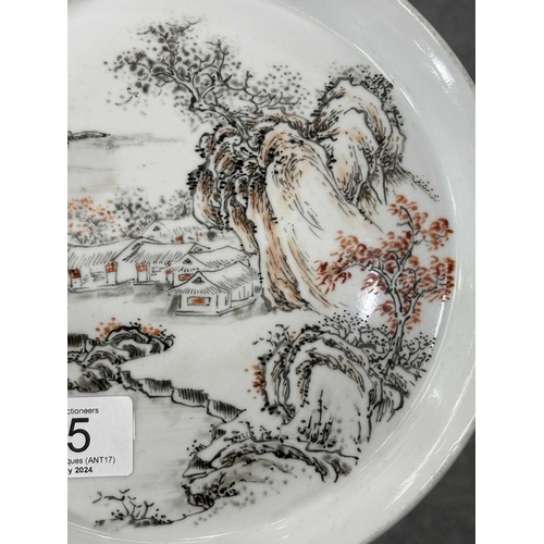 117 - A CHINESE 'LANDSCAPE' SAUCER DISH circular with raised sides, bearing a six-character mark in double... 