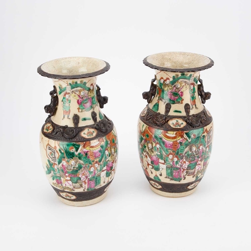 122 - A PAIR OF LATE 19TH CENTURY CHINESE CRACKLEWARE VASES of baluster form, enamel painted with figures.... 