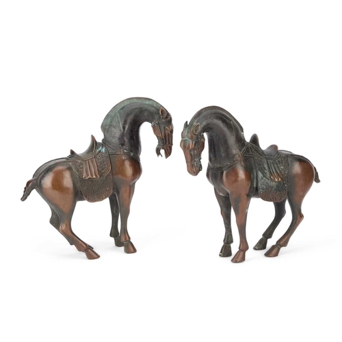 146 - A PAIR OF CHINESE TANG STYLE BRONZE HORSES (2) 27cm high