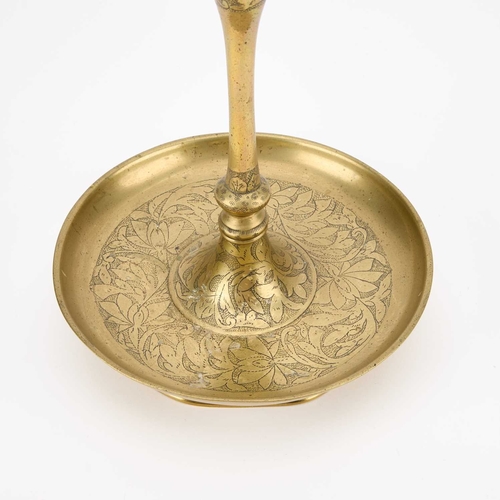 168 - A BRASS AND TIN CANDLESTAND AND REFLECTOR, PROBABLY KOREAN, CIRCA 1900-1905 the tin reflector decora... 