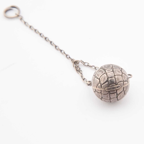 211 - A SMALL AMERICAN STERLING SILVER 'GOLF BALL' SCENT BOTTLE on suspension chain. Bottle 2.4cm high... 