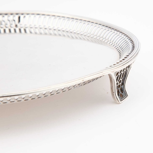 373 - A GEORGE III STYLE SILVER WAITER by Goldsmiths & Silversmiths Co Ltd, London 1916, circular with... 