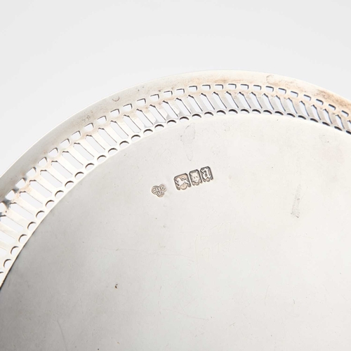 373 - A GEORGE III STYLE SILVER WAITER by Goldsmiths & Silversmiths Co Ltd, London 1916, circular with... 