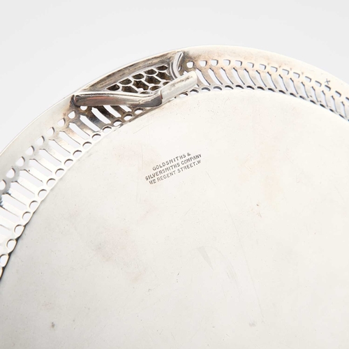 373 - A GEORGE III STYLE SILVER WAITER by Goldsmiths & Silversmiths Co Ltd, London 1916, circular with... 