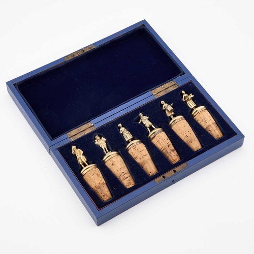 385 - A CASED SET OF SIX VICTORIAN SILVER-GILT NOVELTY FIGURAL WINE BOTTLE STOPPERS possibly by Adolph Pos... 