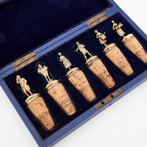 385 - A CASED SET OF SIX VICTORIAN SILVER-GILT NOVELTY FIGURAL WINE BOTTLE STOPPERS possibly by Adolph Pos... 