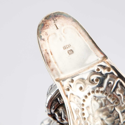 410 - § A VICTORIAN SILVER CLARET JUG by James Dixon & Son, Sheffield 1900, after Cellini, the flared ... 