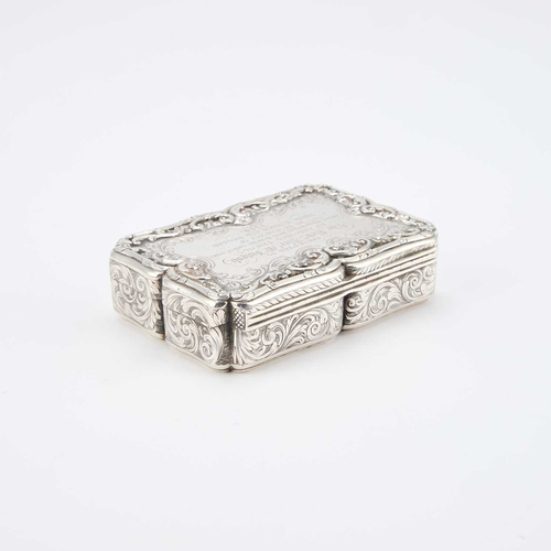 413 - AN EARLY VICTORIAN SILVER TABLE SNUFF BOX by Nathaniel Mills, Birmingham 1842, of shaped rectangular... 