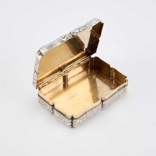 413 - AN EARLY VICTORIAN SILVER TABLE SNUFF BOX by Nathaniel Mills, Birmingham 1842, of shaped rectangular... 