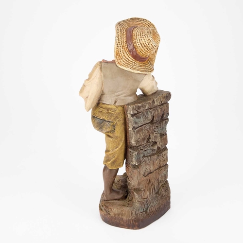 42 - AN AUSTRIAN TERRACOTTA FIGURE OF A BOY unmarked, late 19th/early 20th Century. 33.5cm high