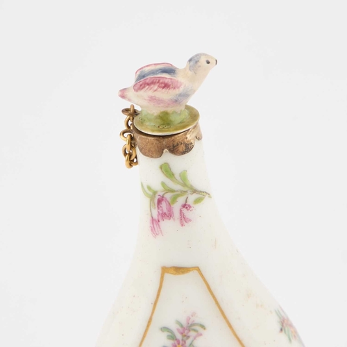 51 - A 19TH CENTURY PORCELAIN SCENT BOTTLE IN CHELSEA STYLE the flask painted to either side with a flora... 