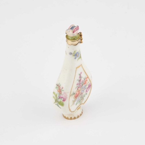 51 - A 19TH CENTURY PORCELAIN SCENT BOTTLE IN CHELSEA STYLE the flask painted to either side with a flora... 