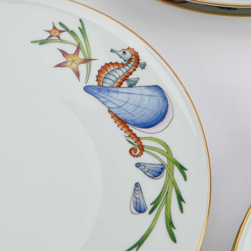 52 - A HEINRICH FISH PATTERN DINNER SERVICE comprising twelve dinner plates, an oval serving dish, and a ... 