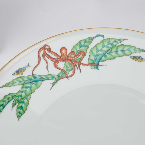 52 - A HEINRICH FISH PATTERN DINNER SERVICE comprising twelve dinner plates, an oval serving dish, and a ... 