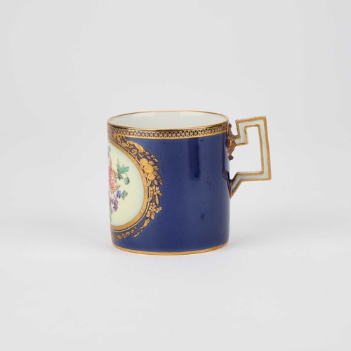 54 - A MEISSEN CABINET CUP AND SAUCER, 19TH CENTURY each painted with a floral spray and with gilt border... 