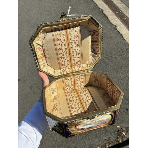 55 - A 19TH CENTURY GILT-METAL MOUNTED SÈVRES STYLE CASKET rectangular with canted corners, painted with ... 