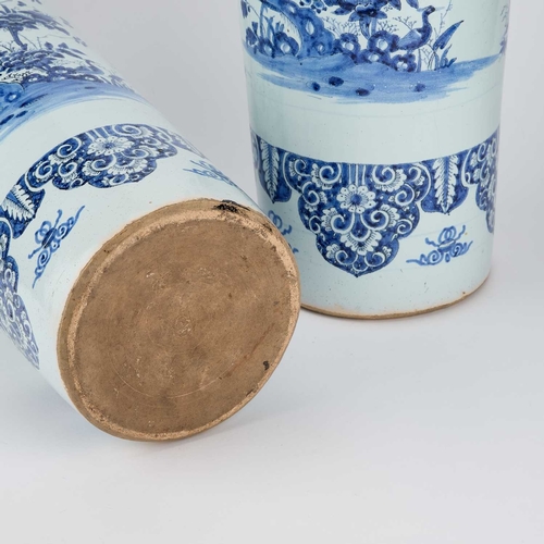 56 - A PAIR OF DUTCH FAIENCE CYLINDRICAL VASES (ROLWAGEN) the sleeve vases blue painted with flying geese... 