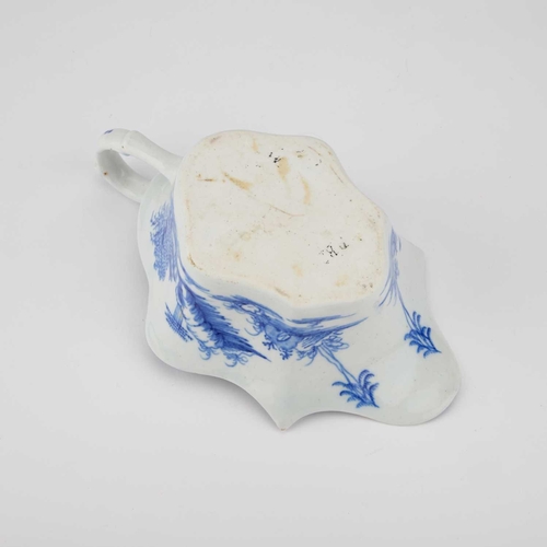 57 - A BOW BLUE AND WHITE SAUCEBOAT, CIRCA 1752-53 of Chinese flat-bottomed leaf shape, decorated in brig... 