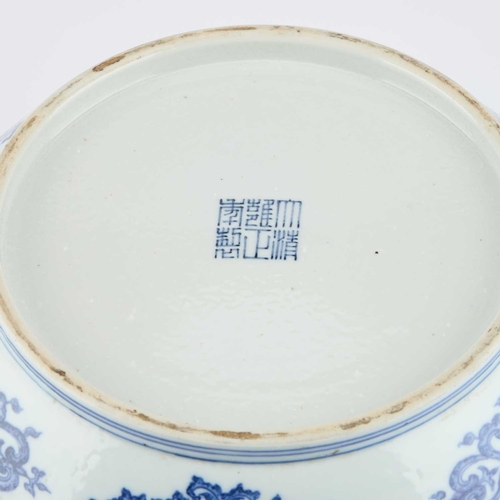 76 - A LARGE CHINESE UNDERGLAZE-BLUE AND COPPER-RED CENSER circular, painted with a Key pattern border ar... 