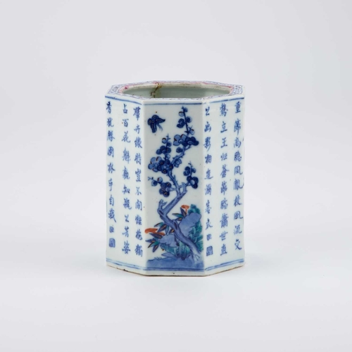 78 - A CHINESE BLUE AND WHITE BRUSHPOT, QING DYNASTY decorated with the 'Three Friends of Winter' pattern... 