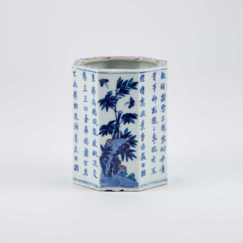 78 - A CHINESE BLUE AND WHITE BRUSHPOT, QING DYNASTY decorated with the 'Three Friends of Winter' pattern... 