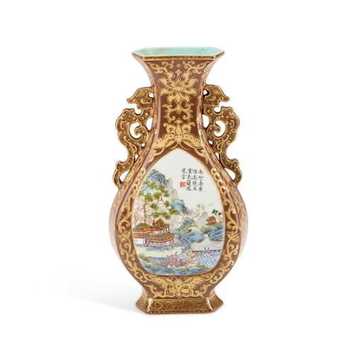 81 - A CHINESE FAUX BRONZE PORCELAIN VASE decorated with two landscape reserves, the ground richly gilded... 