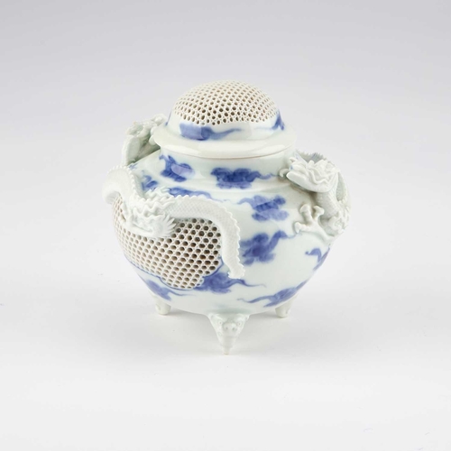 82 - A JAPANESE HIRADO PORCELAIN RETICULATED CENSER Meiji period (1868-1912), globular form raised on ani... 