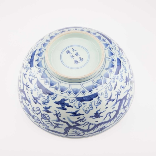 91 - A LARGE CHINESE BLUE AND WHITE BOWL bearing Jiajing mark and possibly of the period, the exterior pa... 