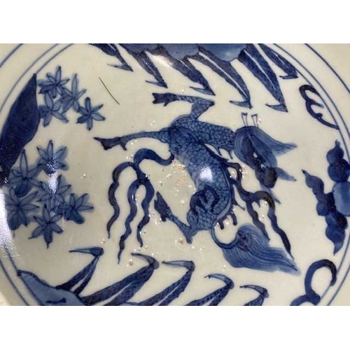 91 - A LARGE CHINESE BLUE AND WHITE BOWL bearing Jiajing mark and possibly of the period, the exterior pa... 