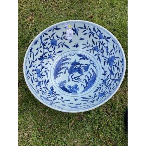 91 - A LARGE CHINESE BLUE AND WHITE BOWL bearing Jiajing mark and possibly of the period, the exterior pa... 