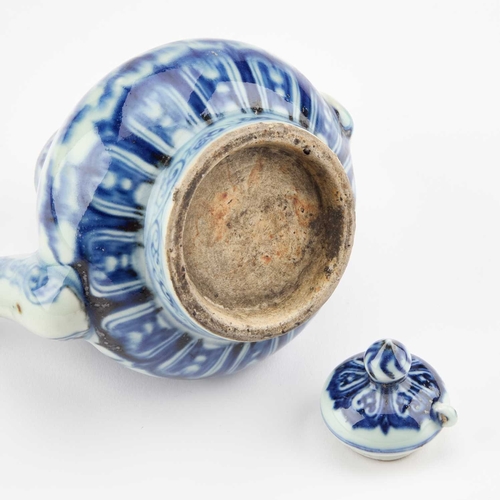 99 - A CHINESE BLUE AND WHITE TEAPOT with a domed cover and dragon-decorated body. 14cm high