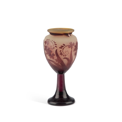 26 - ÃMILE GALLÃ (FRENCH, 1846-1904), A CAMEO GLASS GOBLET etched with flowers and foliage, signed in c... 