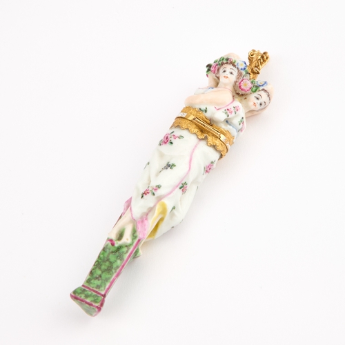 27 - A RARE CHELSEA PORCELAIN FIGURAL SCENT BOTTLE AND BODKIN CASE, CIRCA 1760 modelled as the three grac... 