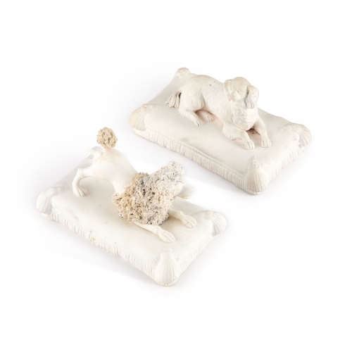 28 - A PAIR OF MINTON BISCUIT DOG MODELS, CIRCA 1830-40 modelled as a King Charles Spaniel and a Poodle, ... 