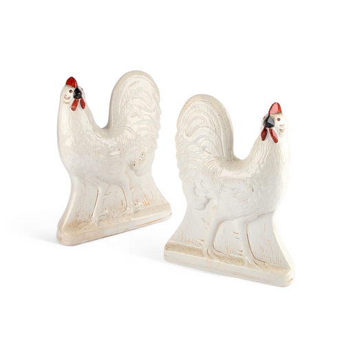 48 - A LARGE PAIR OF STAFFORDSHIRE POTTERY COCKERELS, CIRCA 1860 the white ground body moulded with feath... 