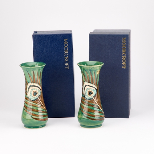 51 - A PAIR OF MOORCROFT POTTERY VASES, DESIGNED BY SALLY TUFFIN FOR LIBERTY & CO tubelined and hand-pain... 