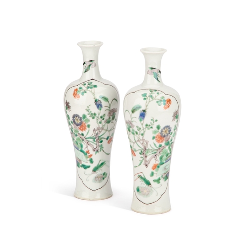 56 - A PAIR OF CHINESE FAMILLE VERTE VASES, CIRCA 1900 of slender baluster form with waisted necks, under... 