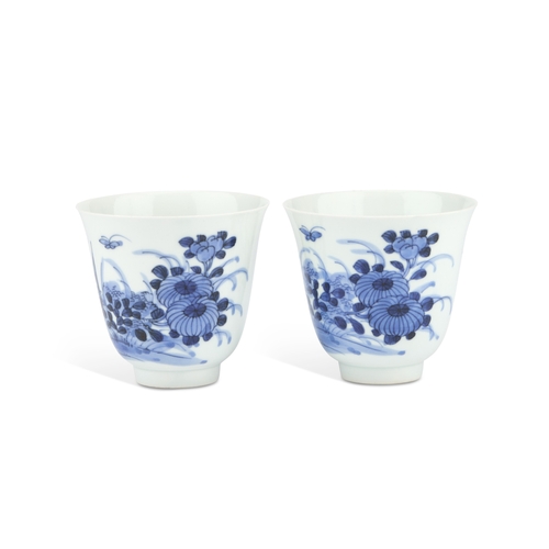 66 - A PAIR OF CHINESE BLUE AND WHITE WINE CUPS of inverted bell form, painted with flying insects and fl... 