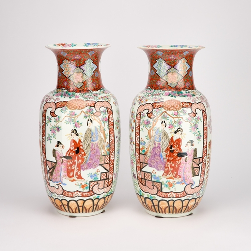 71 - A LARGE PAIR OF CHINESE FAMILLE ROSE VASES of baluster form, each painted with figures, with painted... 