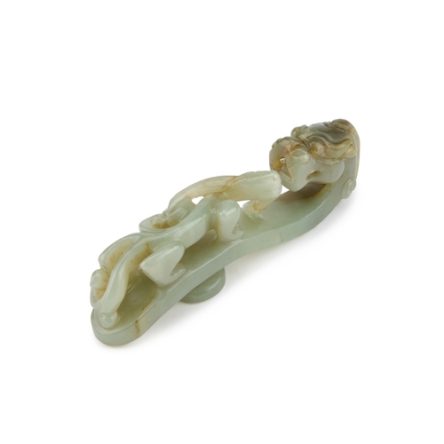 84 - A CHINESE JADE 'DRAGON' BELT HOOK 9.5cm longIn very good condition without damage.... 