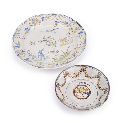 107 - A FAIENCE CHINOISERIE DISH AND A FRENCH FAIENCE DISH (2) First 30cm diameter