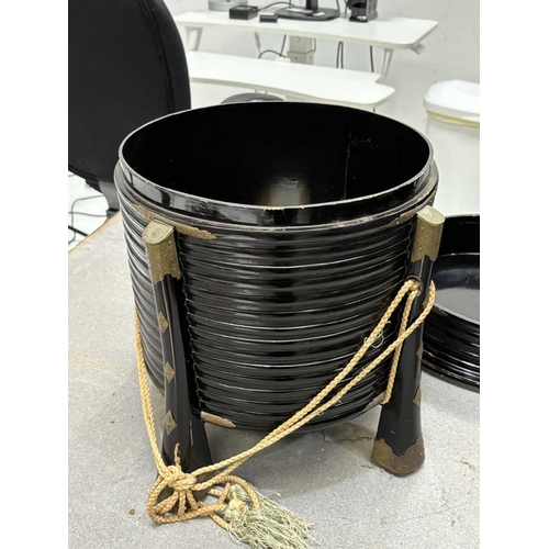 197 - A JAPANESE LACQUER STORAGE BOX (KARABITSU) of ribbed cylindrical form raised on four splayed support... 