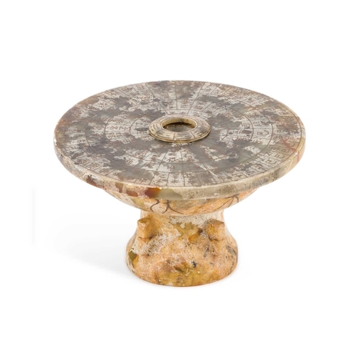 198 - A CHINESE STONE SUNDIAL in two sections. 14cm high, 24cm diameter