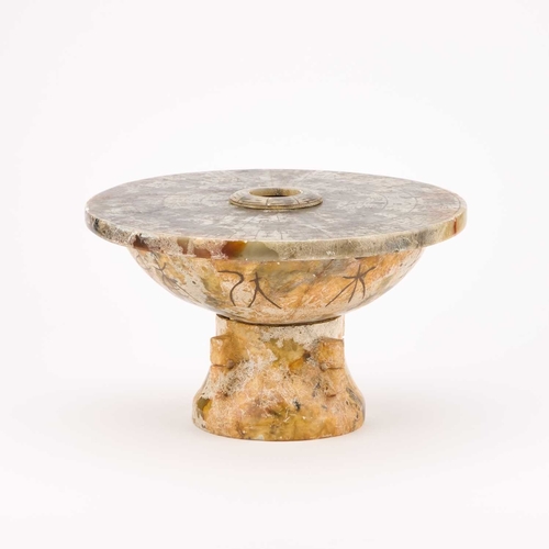 198 - A CHINESE STONE SUNDIAL in two sections. 14cm high, 24cm diameter