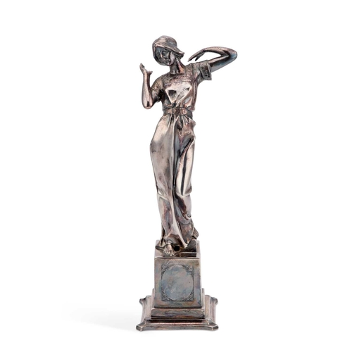 218 - A SECESSIONIST SILVERED METAL FIGURE, CIRCA 1900 cast as a girl standing on a rectangular plinth, in... 