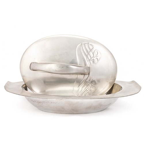 234 - ARCHIBALD KNOX (1864-1933) FOR LIBERTY & CO, A TUDRIC PEWTER MUFFIN DISH oval-shaped, the lift-off l... 